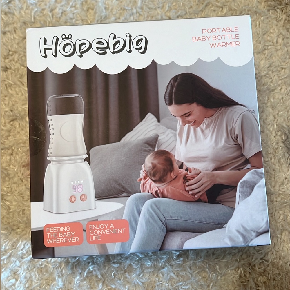 ⭐️NEW⭐️ In the box. Portable bottle warmer
